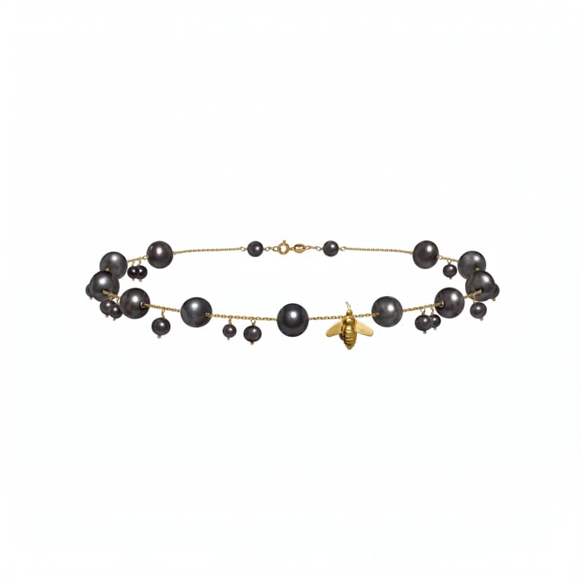 Pulseira Bee em Ouro Amarelo 18K, com Pérolas Negras